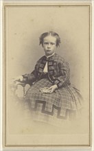 little girl, seated; Nichols & Howard; 1870s; Albumen silver print