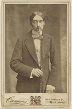 Love on Crutches,Male actor with monocle and a cane to his lips; Cummins, American, active 1870s, about 1880; Platinum print