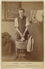 Sophia. Vaudeville Theatre.,Actor washing clothes in wooden tub; Window & Grove; about 1880; Albumen silver print