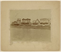 View of houses on canal or river; about 1890; Gelatin silver print