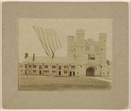 View of possibly a college dormitory with an American flag; American; about 1890; Gelatin silver print