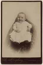 Baby on a cushion; S. Klugherz, American, active Paterson, New Jersey 1860s, about 1880; Albumen silver print