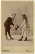 Young boy presenting bouquet to young girl, both bowing; George H. Hastings, American, about 1849 - 1931, 1880s; Albumen silver