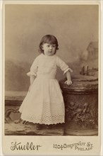 little girl, standing; Kuebler, American, active Baltimore, Maryland 1880s - 1890s, about 1880; Albumen silver print