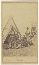 Group of seven soldiers and one black servant at a campsite; Mathew B. Brady, American, about 1823 - 1896, about 1862; Albumen