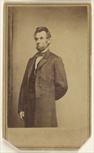 Abraham Lincoln standing with one arm behind his back; Studio of Mathew B. Brady, American, about 1823 - 1896, about 1864
