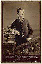well-dressed young man, standing; Gardner, American, active New York, New York 1860s, about 1880; Albumen silver print