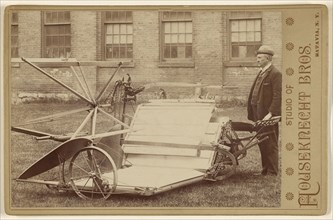 Man posing with a piece of farm machinery; Houseknecht & Brothers; about 1885; Gelatin silver print