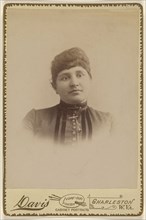 woman, in vignette-style; Davis, American, active about 1920, about 1885; Albumen silver print