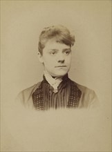 Head shot of an  young woman; J.R. Laughlin, American, active 1860s - 1870s, 1880s; Albumen silver print