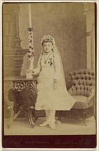 Portrait of a girl wearing a white dress and veil; J. Wolf, American, active 1870s - 1880s, 1870s; Albumen silver print