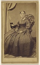 woman seated; Thomas Cummings, American, active 1860s, about 1868; Albumen silver print