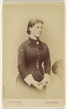 woman with hands together, standing; J. Bateman, British, active 1860s, October 10, 1878; Albumen silver print