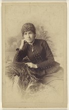 woman seated with hand on cheek, posed on a pile of hay; Miller & Company; 1880s; Albumen silver print