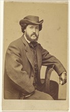 bearded man wearing a hat, seated; Frederick Gutekunst, American, 1831 - 1917, 1870s; Albumen silver print