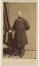 bearded man, standing; Julius Brill, American, active 1850s - 1860s, 1870s; Albumen silver print