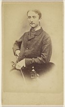 well-dressed man with moustache, seated; J. Craik, British, active Canterbury, England 1860s, October 17, 1881; Albumen silver
