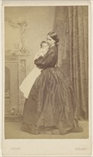 woman holding a child, standing; A. Crowe, British, active 1860s - 1870s, about 1865; Albumen silver print