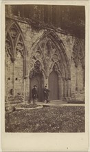 facade at Monmouth, Wales, with two men at front doors; R. Tudor Williams, British, active Monmouth, England 1870s, about 1865