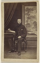 bearded man, seated; J. Picken, British, active Stewarton, England 1860s, 1865 - 1870; Albumen silver print
