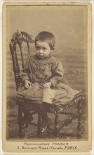 girl with extremely short hair, seated; France, French, active Paris, France 1890s, 1891; Albumen silver print