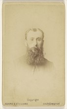 man with a long, square-cut beard, printed in vignette-style; Adams & Stilliard; May 1877; Albumen silver print