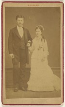 couple, standing; R. Girard, French, active Paris, France 1859 - 1860s, about 1865; Albumen silver print