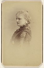 woman in profile, printed in vignette-style; Beer & Company; 1865 - 1875; Albumen silver print