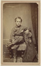Eddie little boy, seated; J.W. Upham, American, active Jamestown, New York 1860s, 1862 - 1865; Albumen silver print