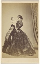 woman holding a child, standing; A. Crowe, British, active 1860s - 1870s, 1865 - 1870; Albumen silver print