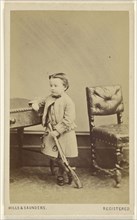 little boy standing, holding a toy rifle; Hills & Saunders, British, active about 1860 - 1920s, about 1865; Albumen silver