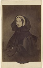 woman dressed in all dark clothes, seated; 1865 - 1870; Albumen silver print