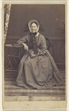 elderly woman wearing a bonnet, seated, holding a fan; Lespinasse, French, active Paris, France, London, England and Madrid
