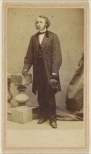 man with long sideburns, standing, holding his hat in his left hand; George Kendall Warren, American, 1834 - 1884, 1862 - 1870