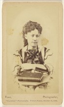 woman seated with arms crossed, books in foreground; Egbert Guy Fowx, American, 1821 - 1889, about 1869; Albumen silver print
