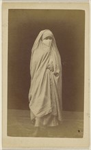Algerian woman wearing a checkered full robe and veil; Claude-Joseph Portier, French, 1841 - 1910, 1865 - 1880; Albumen silver