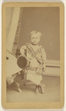 little boy standing, holding a cap; Fernando Dessaur, American, active 1880s, 1870 - 1875; Albumen silver print