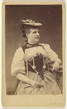 woman in native costume with hat, seated; A. Gabler, Swiss, active 1860s - 1890s, about 1876; Albumen silver print