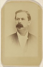 man with bushy moustache, printed in vignette-style; A. & G. Taylor, British, active Leeds, England 1890s, 1865 - 1875; Albumen