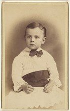 little boy wearing a bow tie, seated; Hastings & White & Fisher; about 1880; Albumen silver print