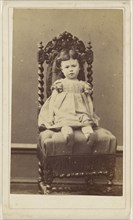 little girl, seated; Th. Schahl, French, active Dijon, France 1860s, 1865 - 1875; Albumen silver print