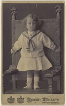 little girl standing in an ornate chair; Rumbler, German, active Wiesbäden, Germany 1860s - 1870s, 1875 - 1880; Carbon or