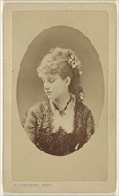 woman looking down, printed in quasi-oval style; Alphonse J. Liebert, French, 1827 - 1913, 1865 - 1875; Albumen silver print