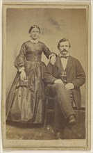 couple: woman standing holding a book and a man with moustache seated; J.W. Smith, American, active Lewistown, Pennsylvania