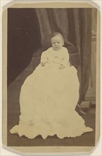 baby wearing a long gown, seated on a couch; Peter S. Weaver, American, active Hanover, Pennsylvania 1860s - 1910s, 1865-1875