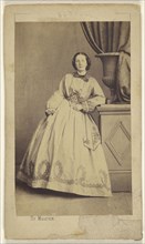 woman, standing, leaning on a fake pillar; Ile Maurice, French, active 1860s, 1865 - 1868; Albumen silver print