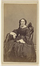woman, seated; J. H. Abbott, American, active 1860s - 1870s, 1870 - 1879; Albumen silver print