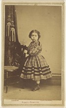 little girl standing, holding a chair back; Jeremiah M. Greene, American, active 1850s - 1890s, 1865 - 1875; Albumen silver
