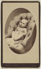 baby seated in a leather arm chair; Constant Peigne, French, 1834 - 1916, about 1870; Albumen silver print