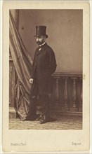 bearded man wearing a top hat, standing; André Adolphe-Eugène Disdéri, French, 1819 - 1889, 1862 - 1865; Albumen silver print